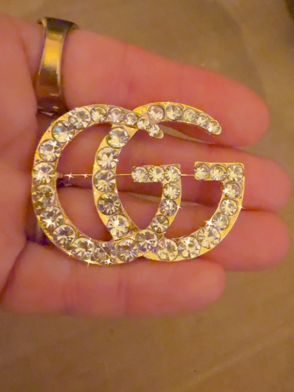Double G brooch